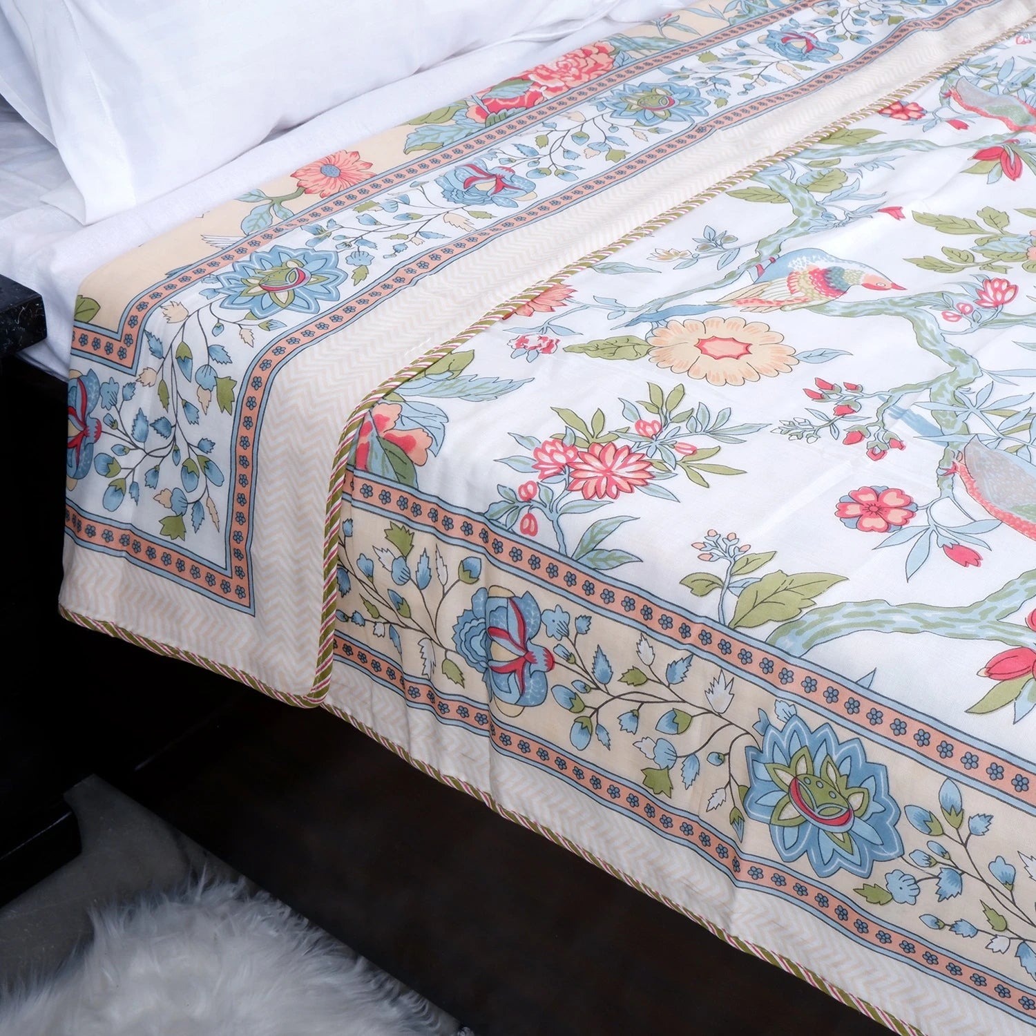 The Jaipuri 100% cotton dohar blanket online featuring vibrant floral patterns and intricate borders